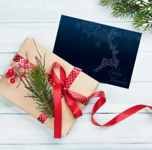 Schönes Geschenk und Weihnachtsgrußkarte in blau als Klappkarte für Weihnachtsgrüße