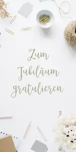 Eine Grußkarte mit dem Text: "Zum Jubiläum gratulieren."