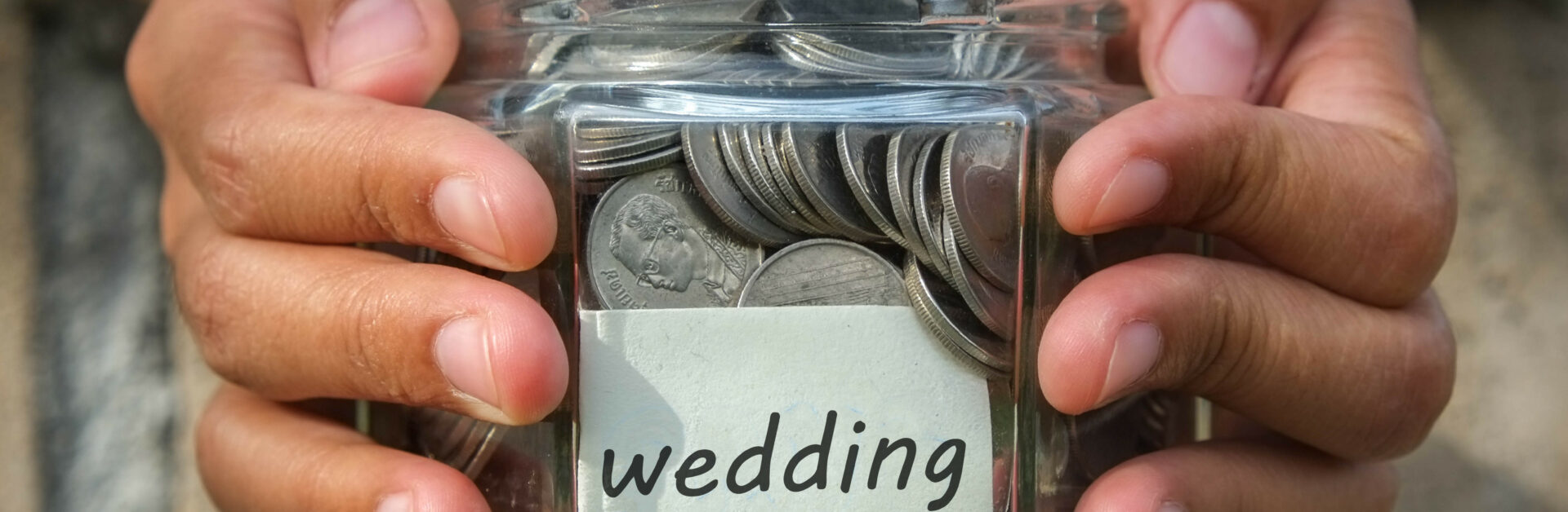 Finanzierung Hochzeit, Glas mit Münzen